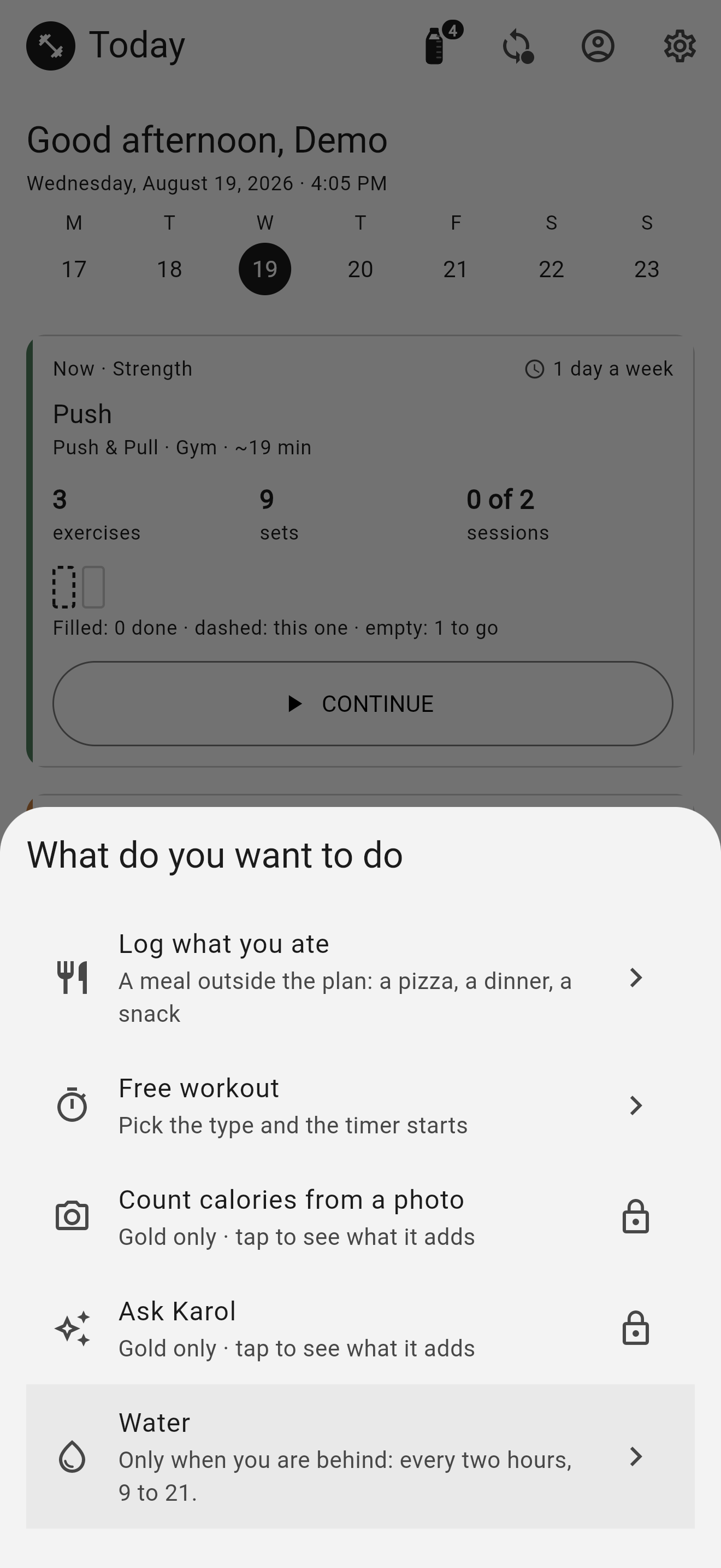 The «What do you want to do» sheet open over the day: log what you ate, free workout, count calories from a photo and ask Karol — the last two with a padlock and the line «Gold only» — and water at the bottom.